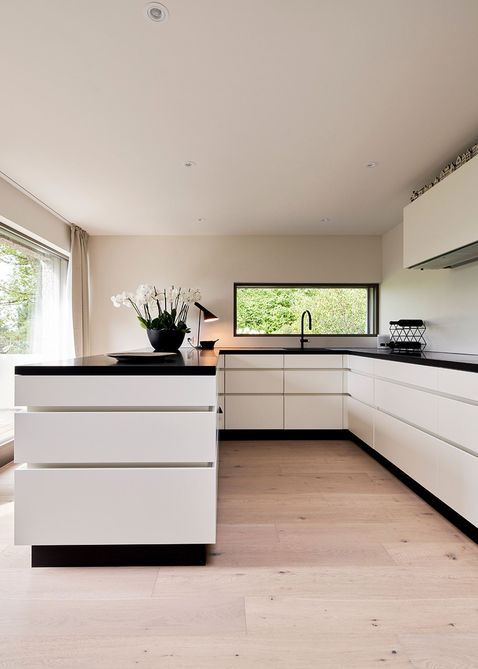 White kitchen with black worktop