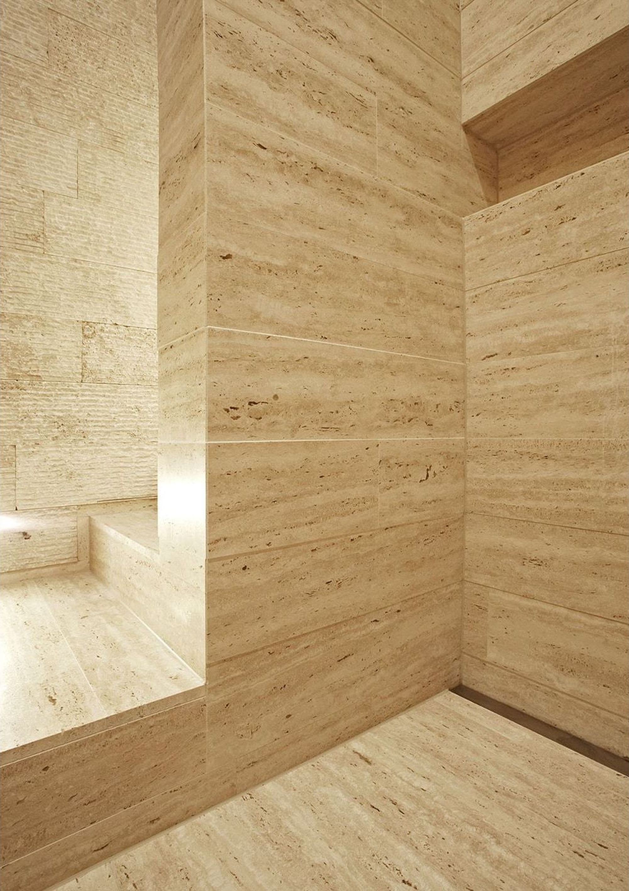 Room with light timber walls and floor – Apartment building in Uitikon