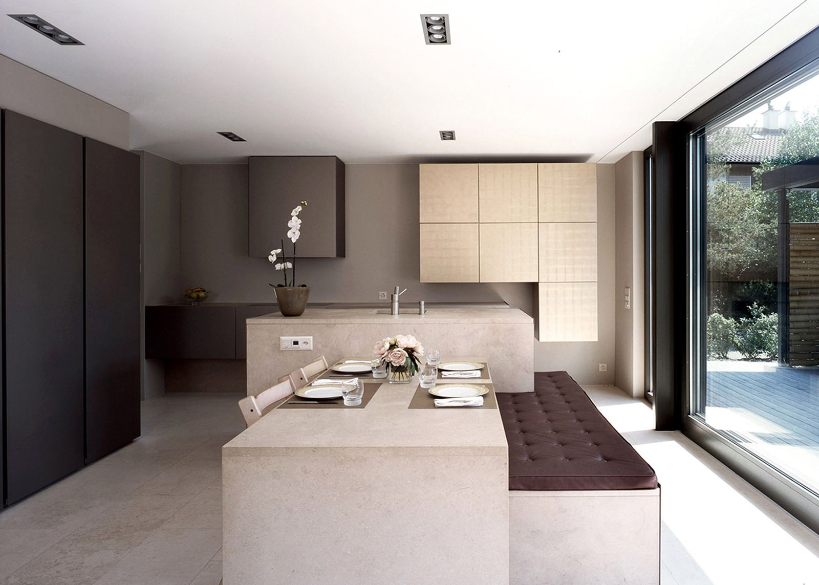 Kitchen with long island and bench