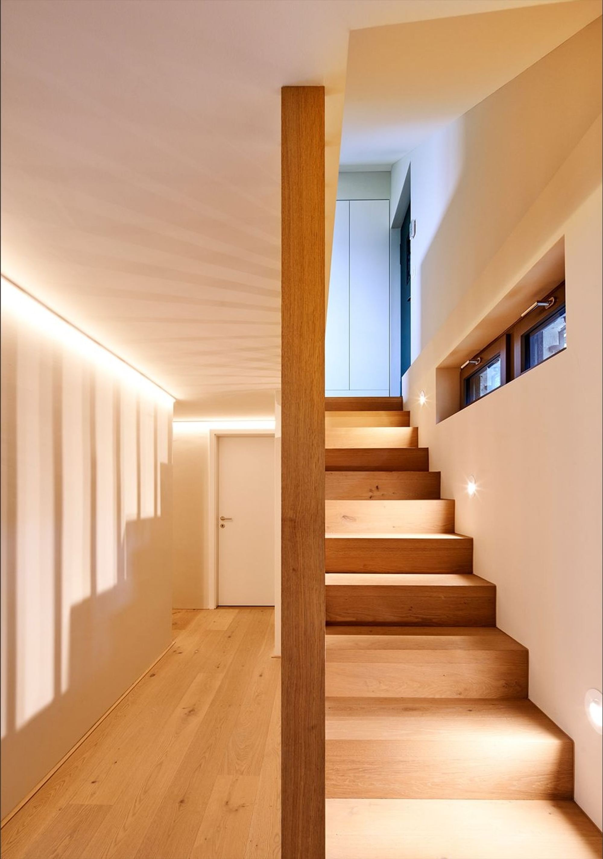 Timber staircase with strip lighting and timber post – Interiors and landscape, Meilen