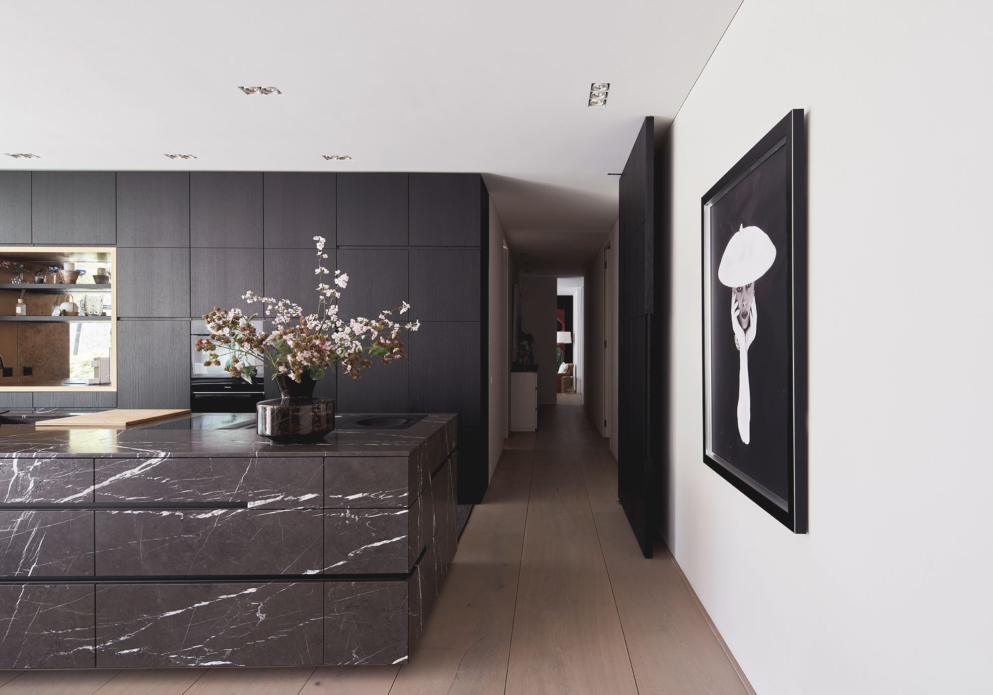 Kitchen island and hallway with artwork – Interiors and landscape, Luzern