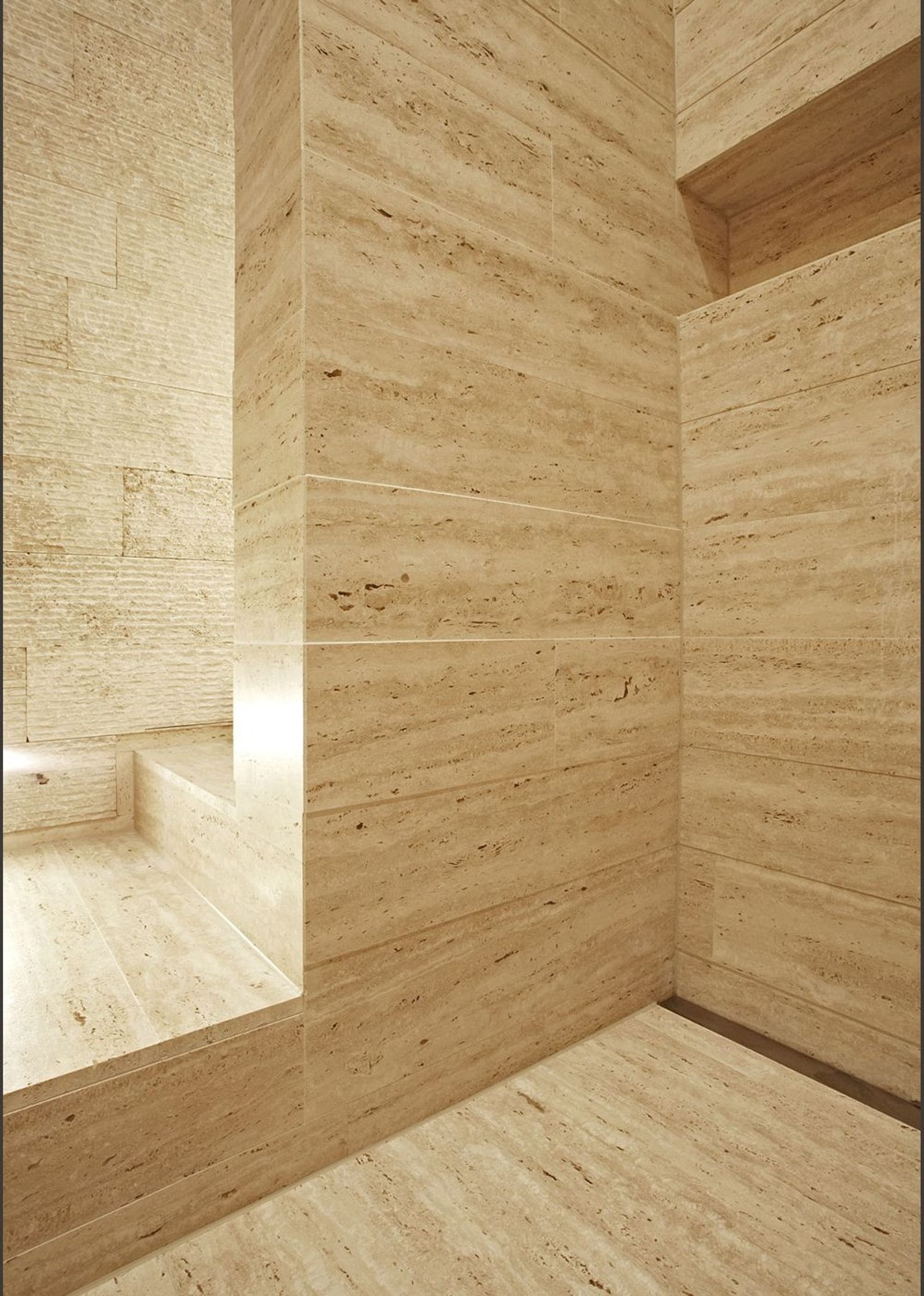 Room with light timber walls and floor – Apartment building in Uitikon