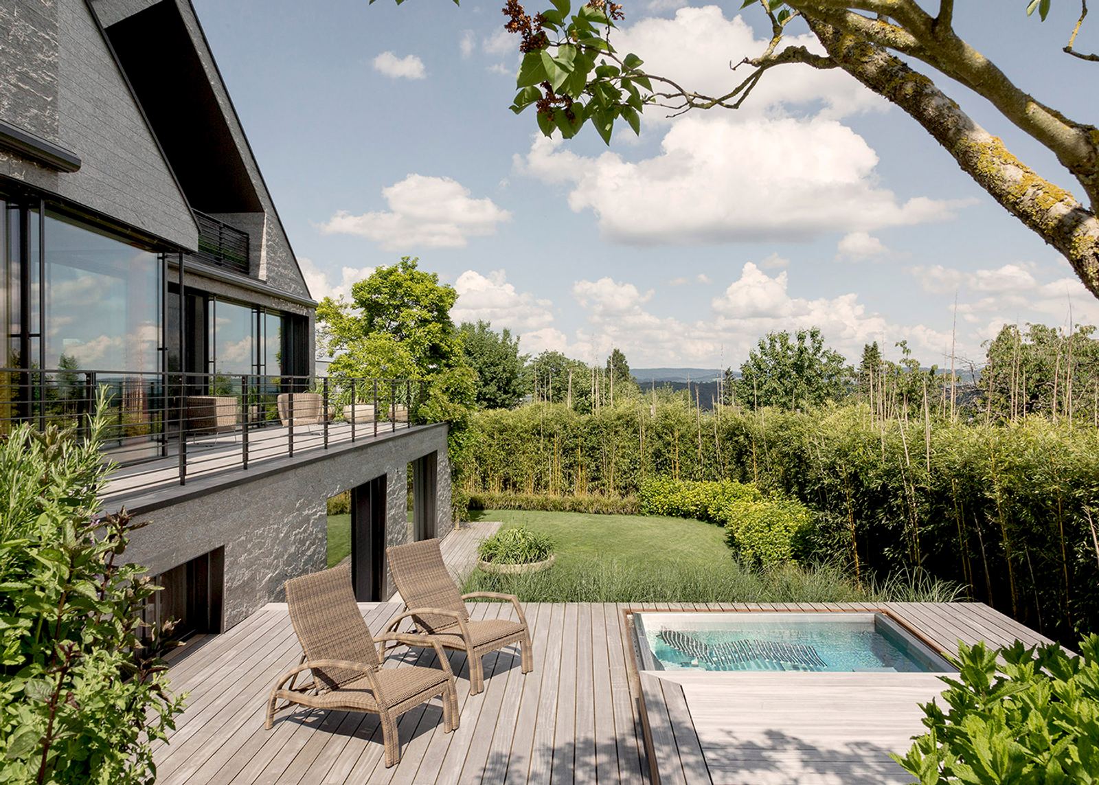 Timber deck with loungers and hot tub