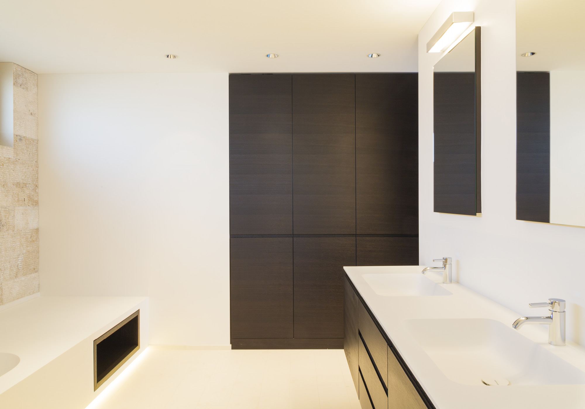 Bathroom with double washbasin and dark cabinets – Single-family house in Wollerau