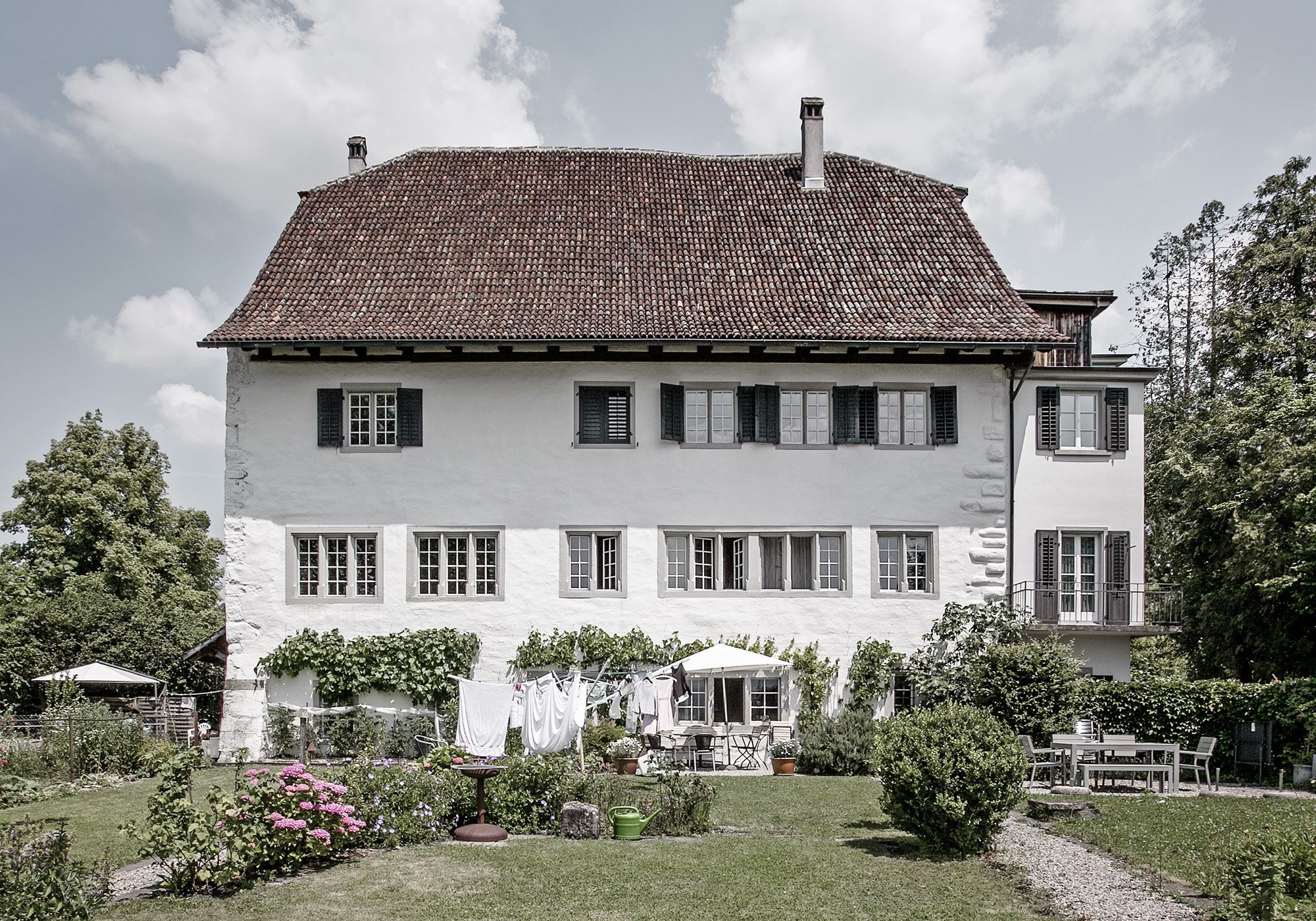 Historic country house with hipped roof and garden – Historic conversion in Uerikon