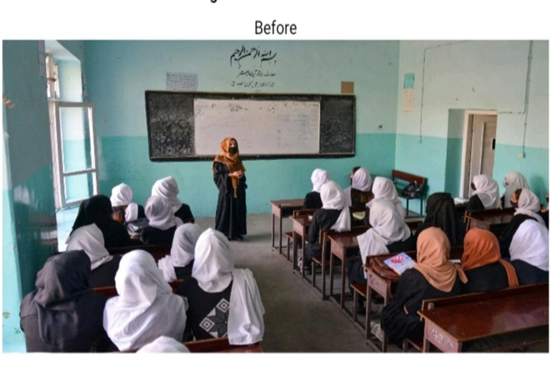 A teacher in a niqab instructs a classroom of female students wearing headscarves.