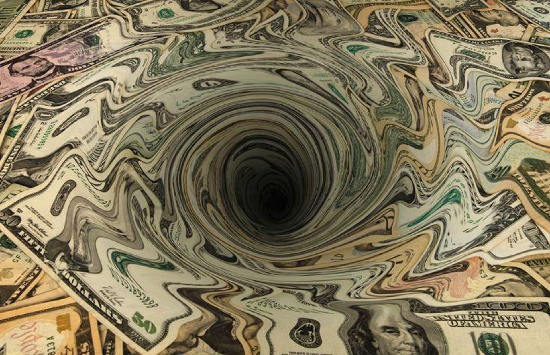A swirling vortex of US dollar bills descends into a black hole.