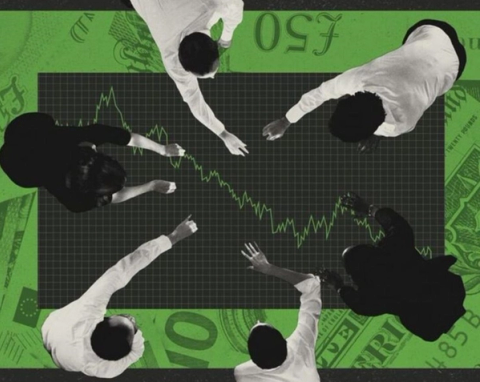 Overhead view of six people looking at a fluctuating market graph, surrounded by green currency notes.