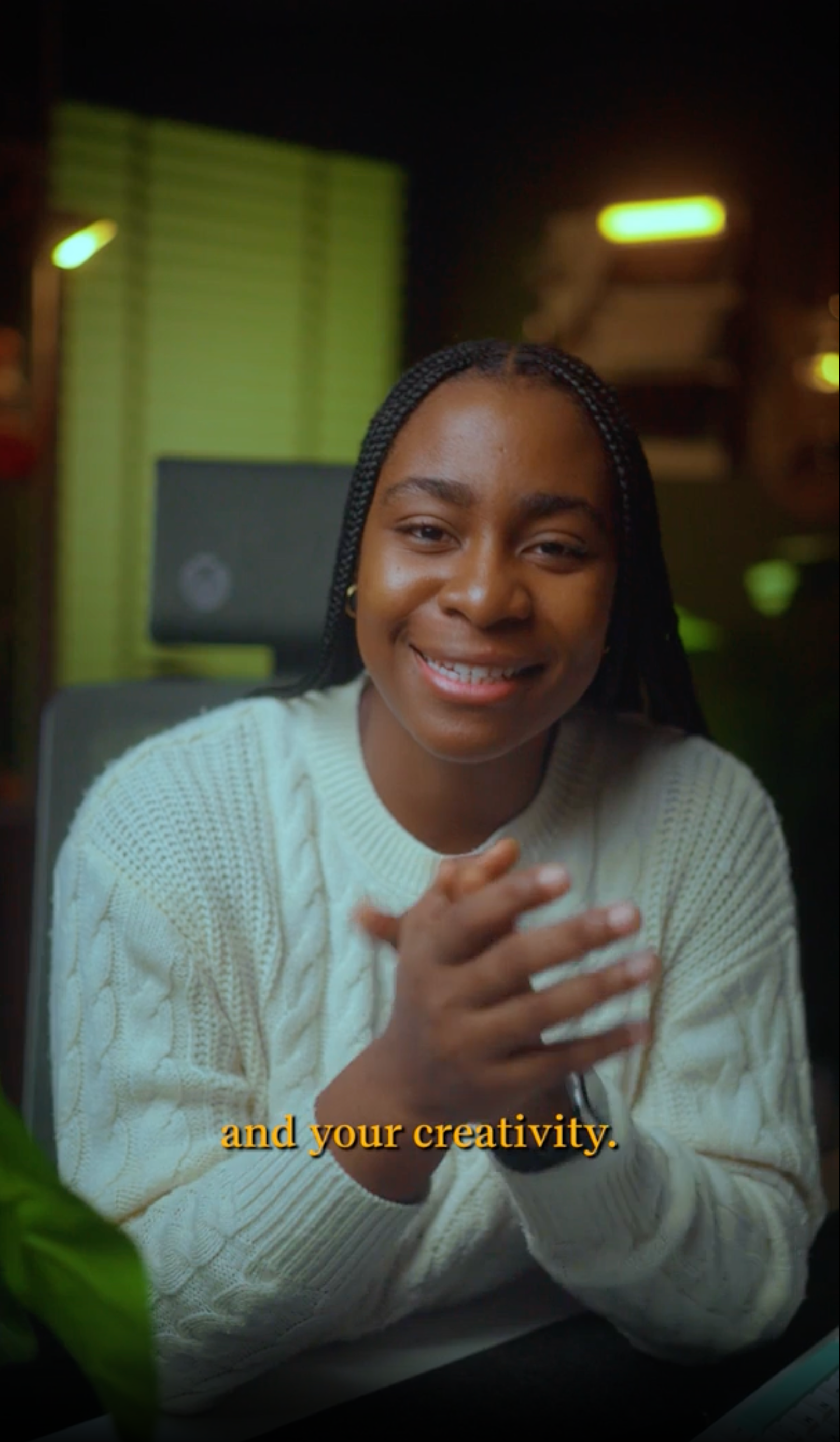 Person by water with city skyline
