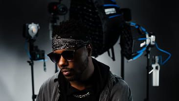 Urban portrait with pink lighting