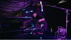 Urban portrait with pink lighting