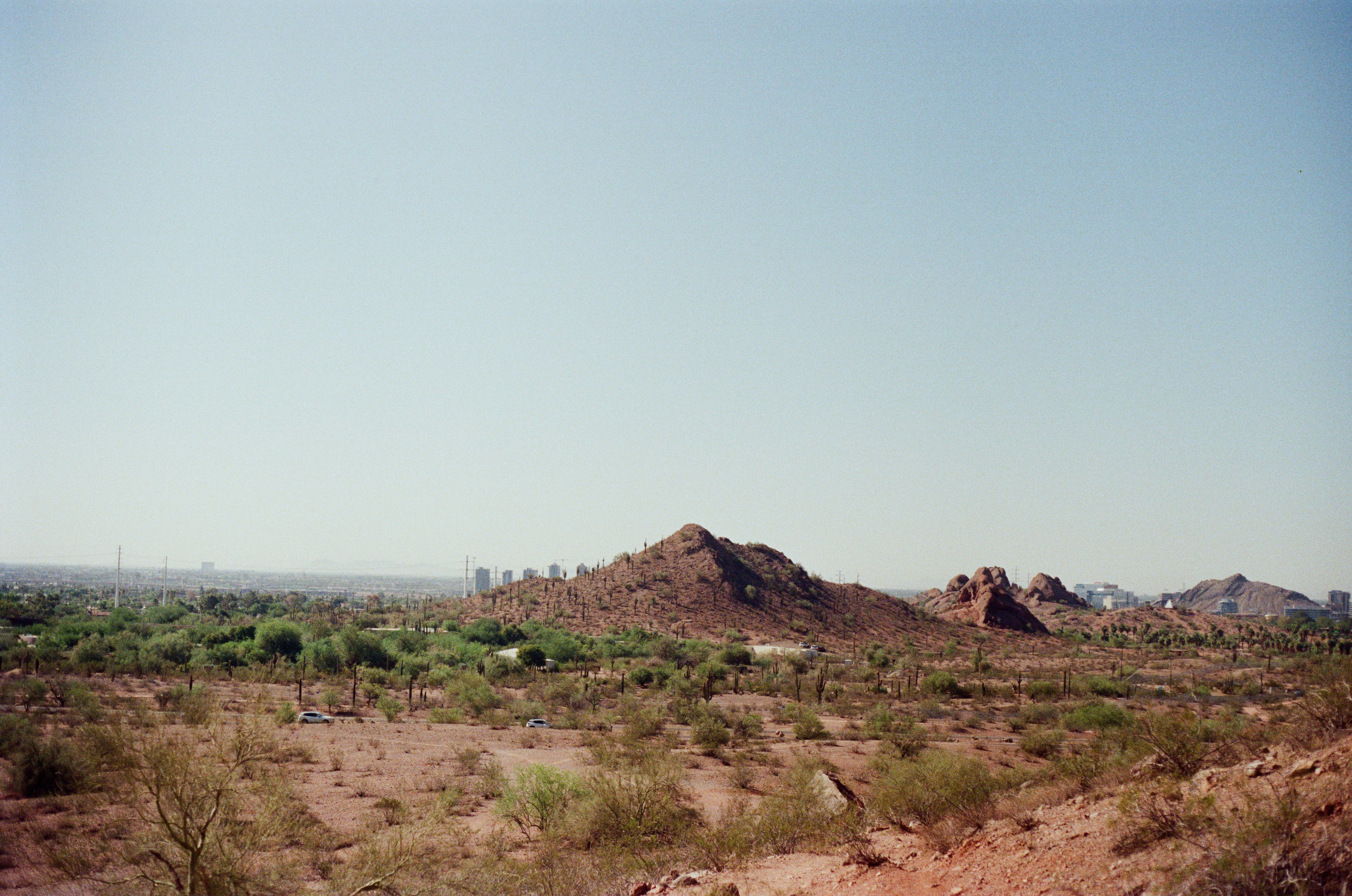 Desert landscape with mountains under a blue sky