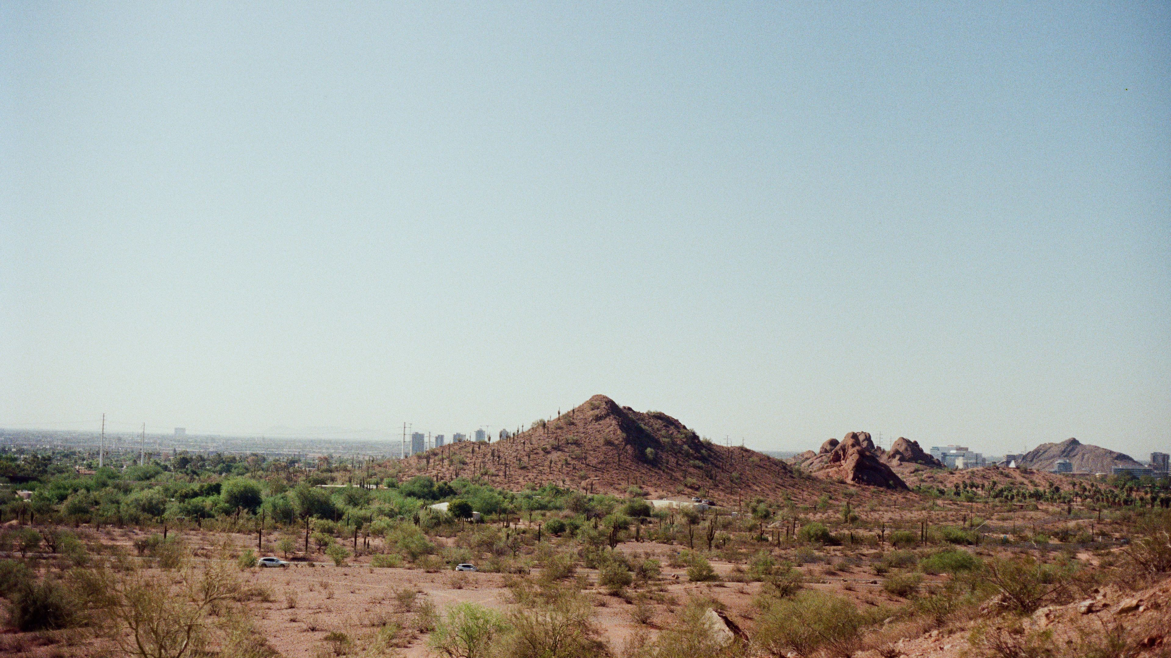 Desert landscape with mountains under a blue sky