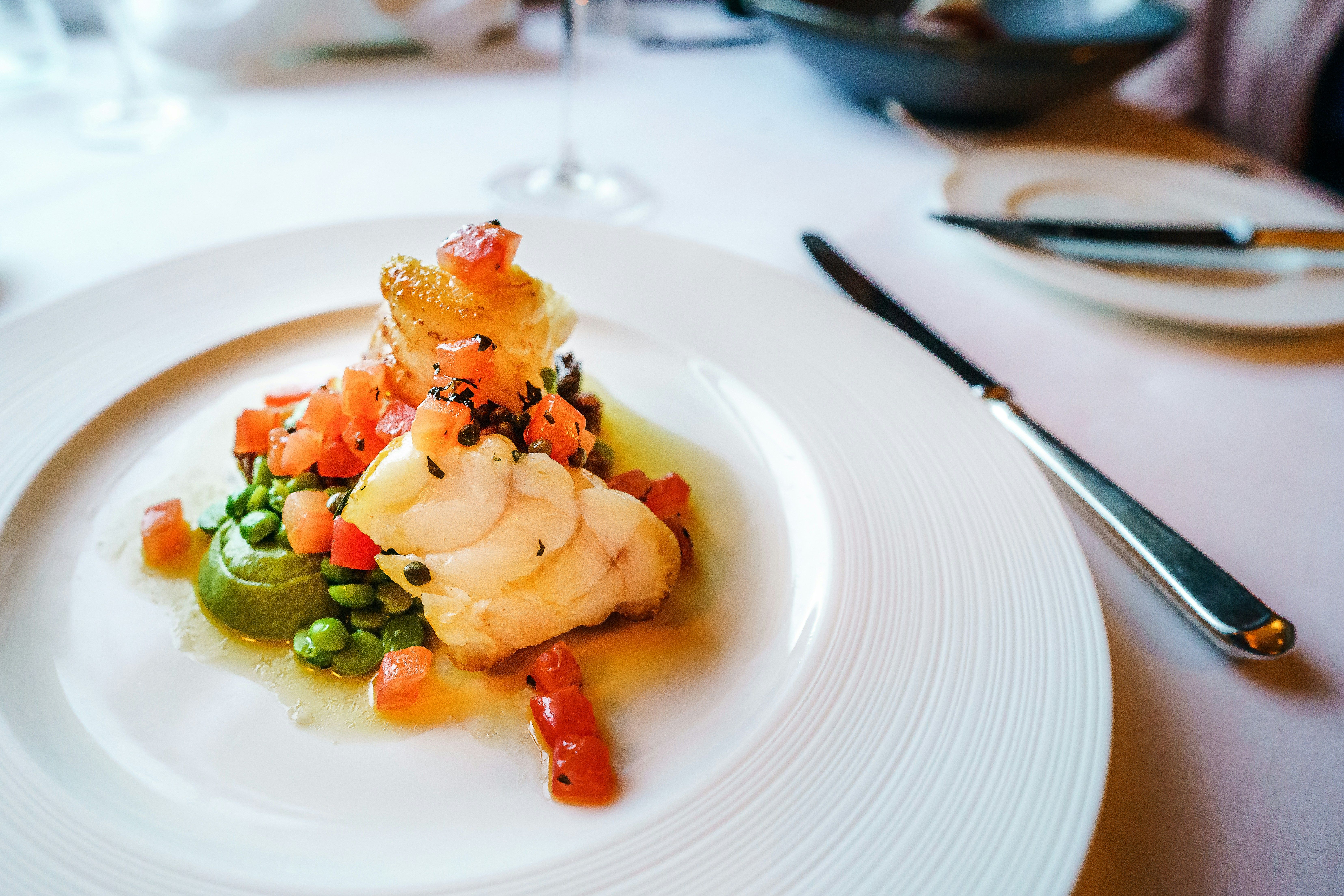 White ceramic plate with stainless steel fork