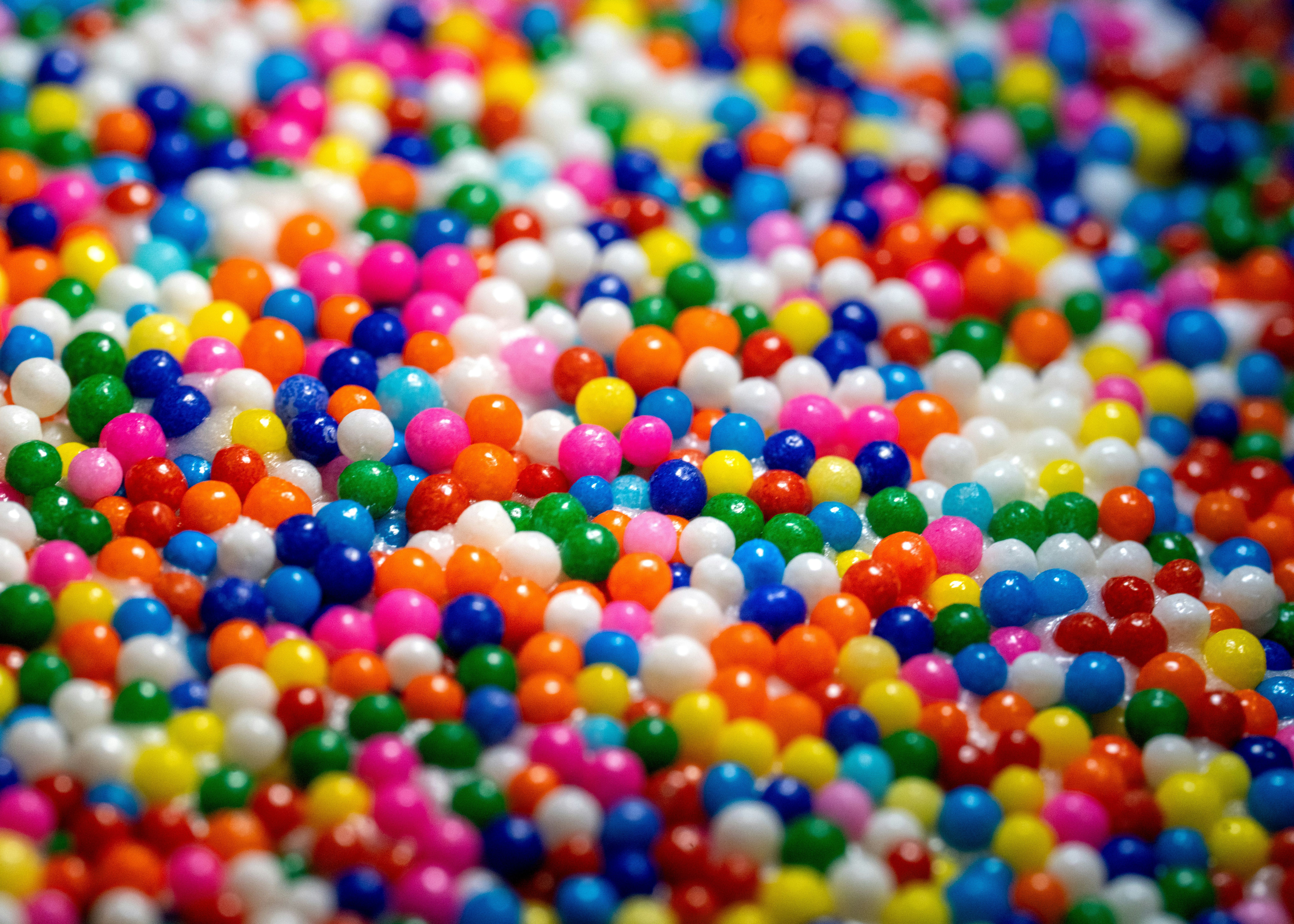 A vibrant pile of colorful candy sprinkles