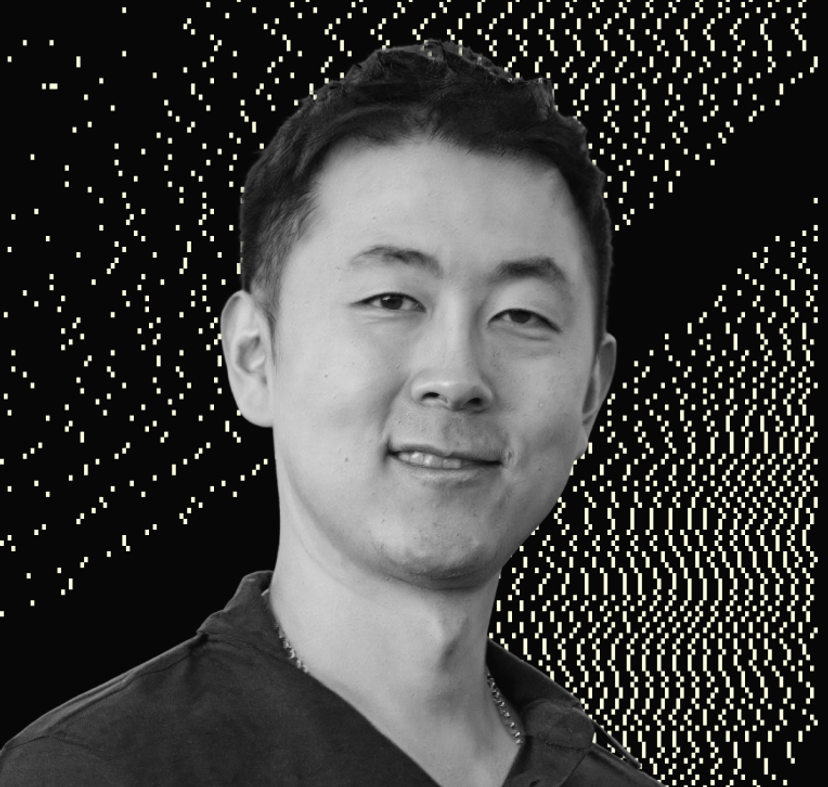 a black and white photo of a man 's face