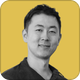 a black and white image of Jason Gong in a yellow background