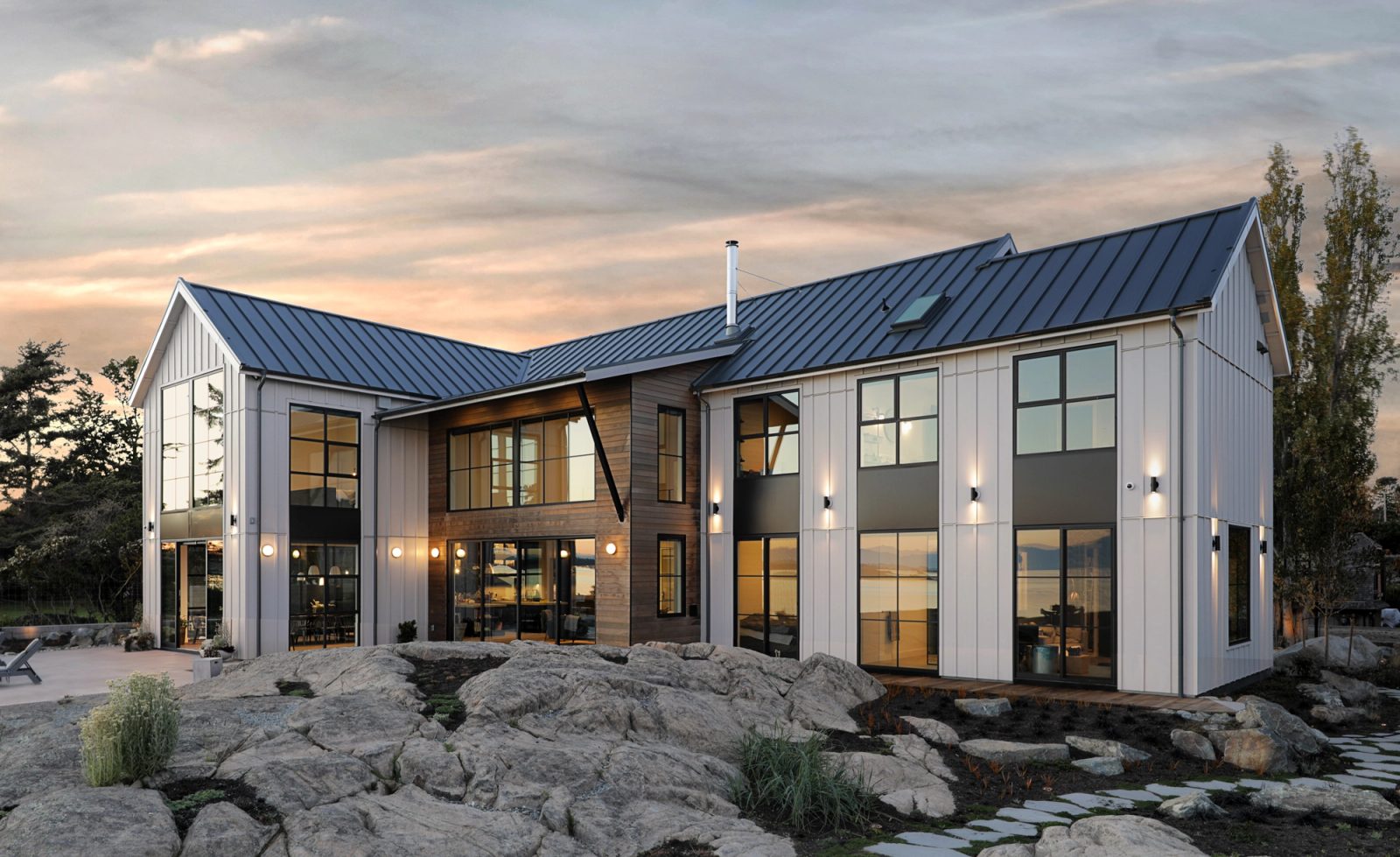 Rear elevation on the granite shelf at dusk