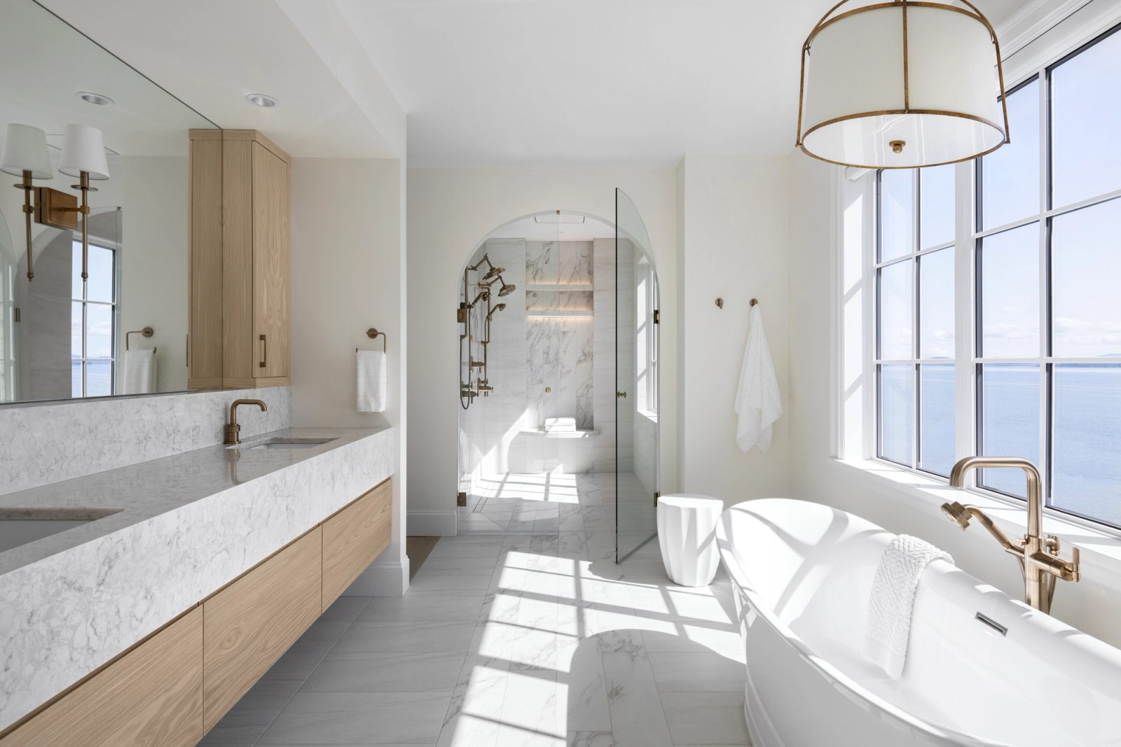 Primary bathroom, arched shower, water in the window
