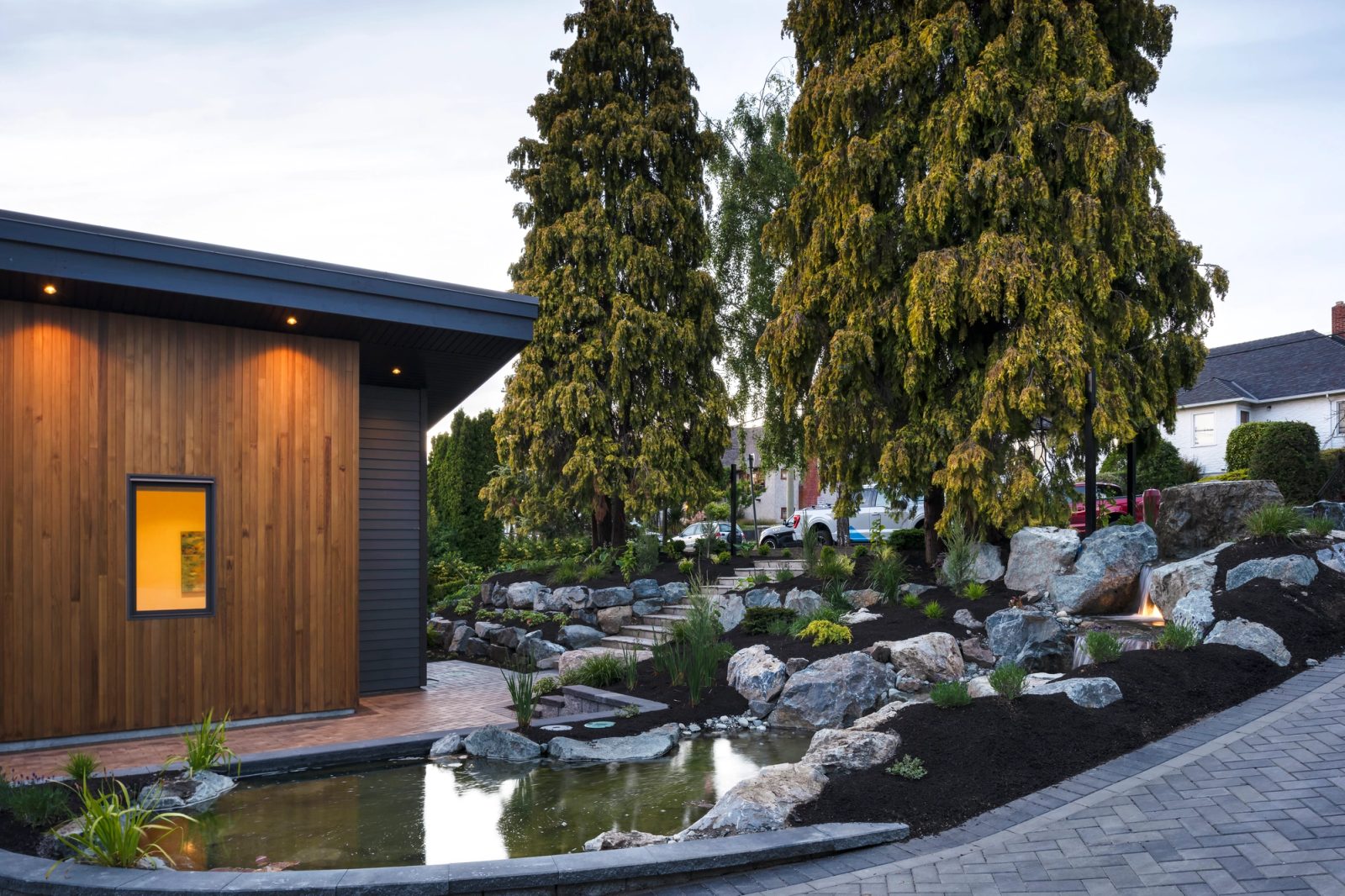 water feature beside the driveway of a private west coast estate property