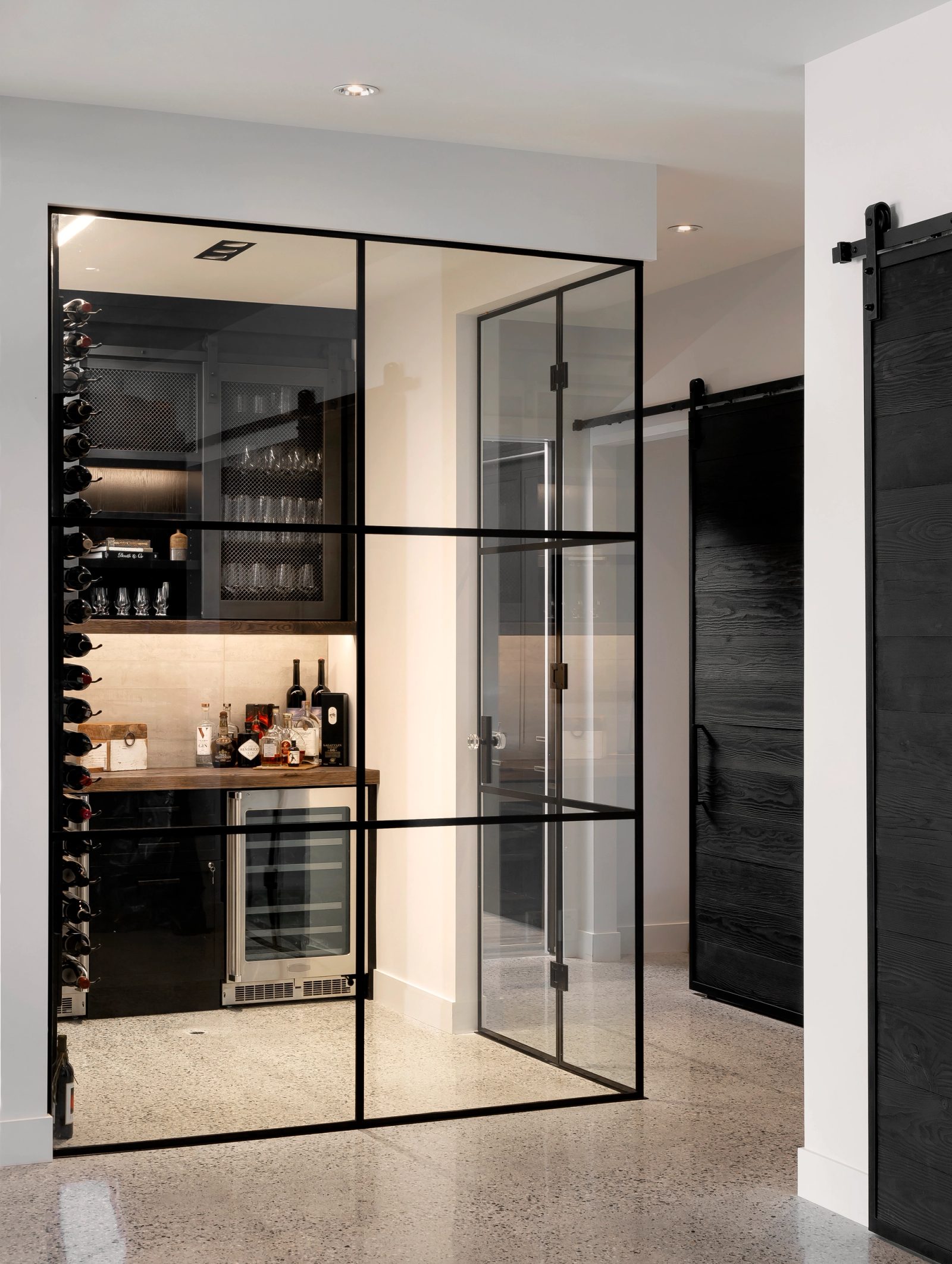 Fireplace detail and the wine room