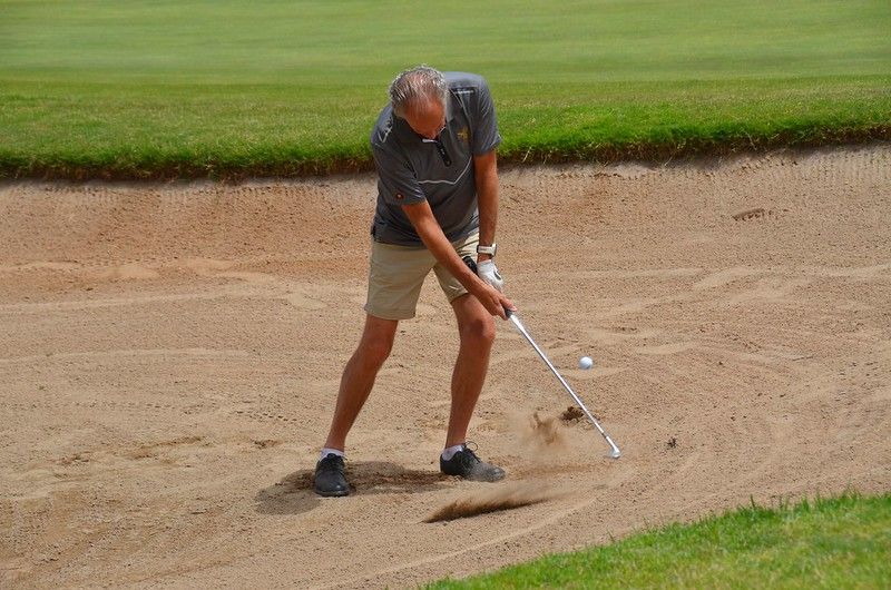 Golfer hits bunker shot at the Wasps Legends Rugby Golf Classic La Manga 2024
