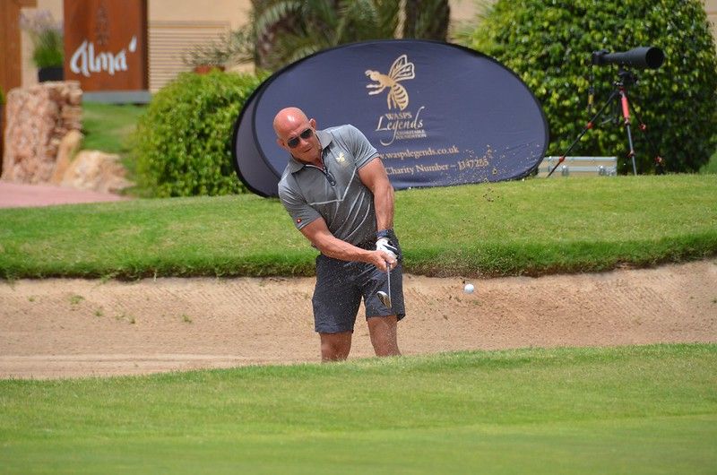 Golfer chips from the bunker at the Wasps Legends Rugby Golf Classic La Manga 2024