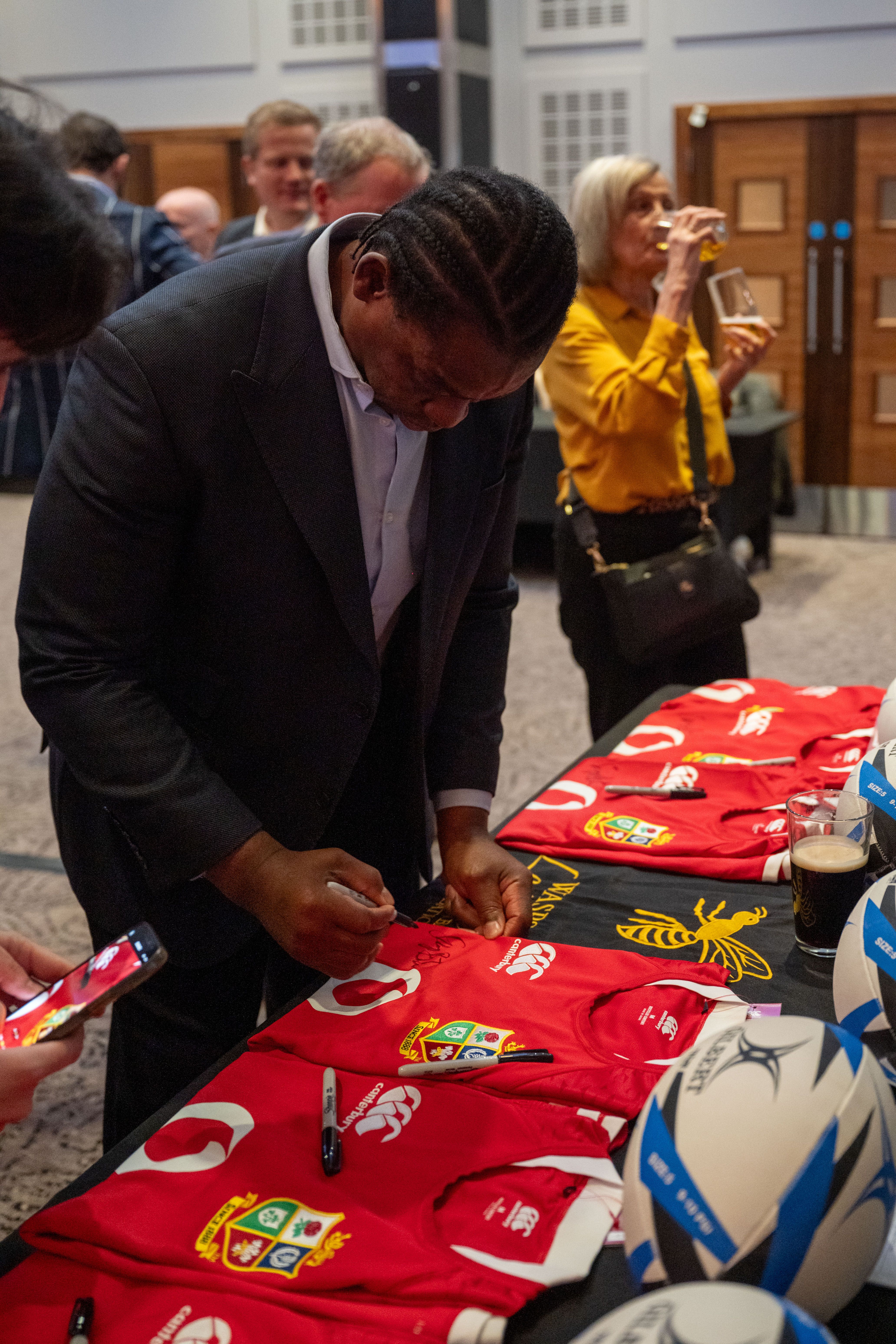 Serge Betsen signs British & Irish Lions shirts