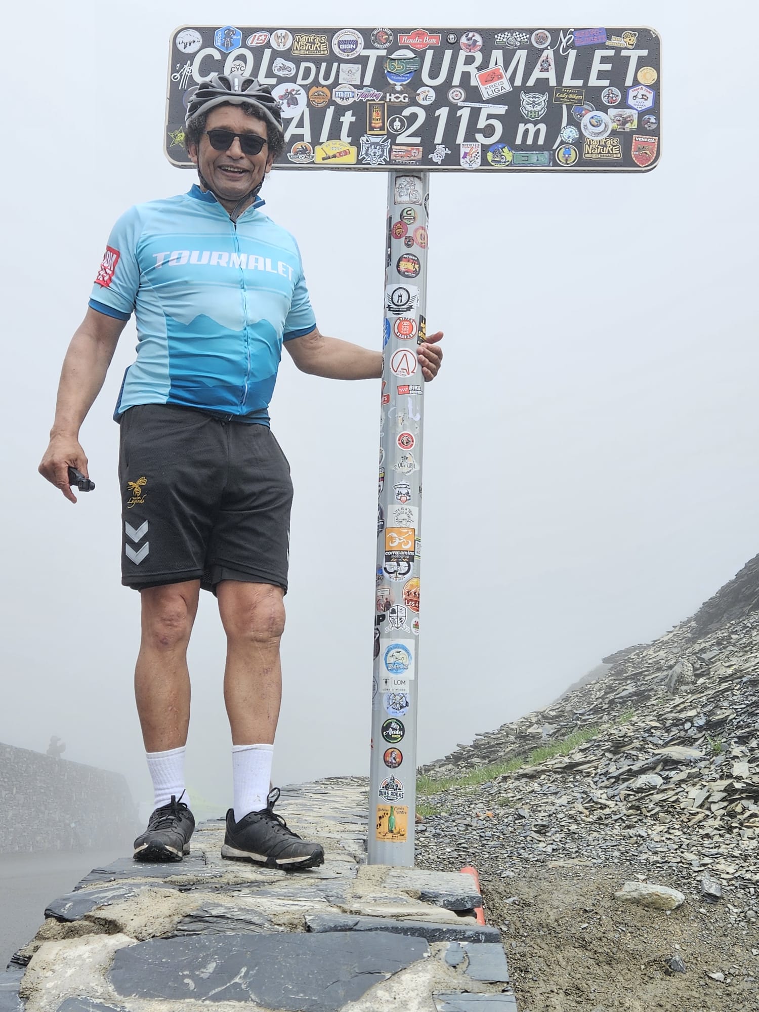 Sol N'Jie at the summit of the Col du Tourmalet cycle path