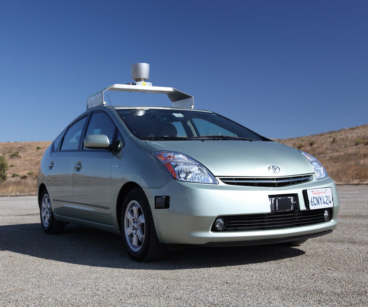 Images show a car with cameras, radar, and a roof rack holding a large lidar instrument, with callouts identifying the location of various instruments.