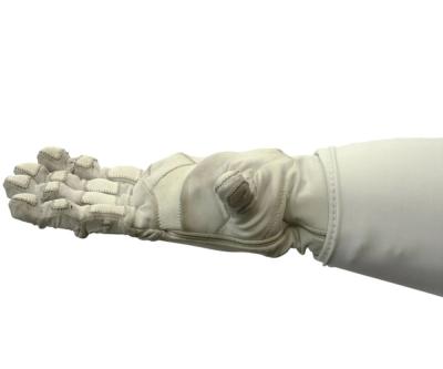 Close-up of the robots hand, covered in fabric suitable for space, as it flexes its fingers.