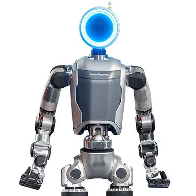 A grey and silver bipedal robot with a circular head that glows blue, and long arms and gripper hands.