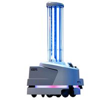 A wheeled mobile base with colorful lights inside supports a vertical column of brightly lit UV lightbulbs.