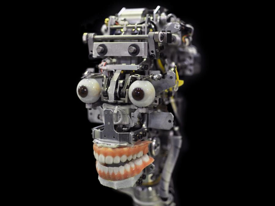 A view under the robots skin shows just the electronics inside, plus eyeballs and teeth.