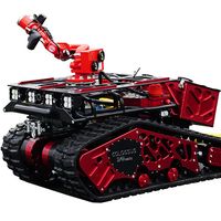 A large red robotic vehicle with tracks and an articulated arm.