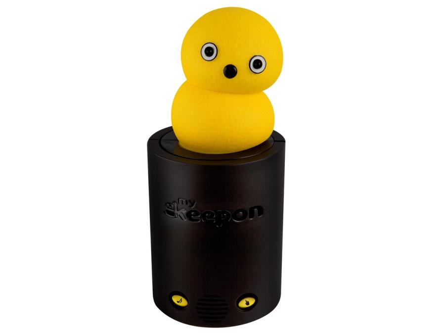 A robot that looks like two yellow balls squished together, with googly eyes and a button nose, on a black stand.