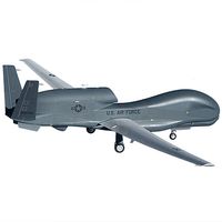 Global Hawk is an unmanned aerial vehicle the size of a plane with a similar shape including a curved front, wings and stabilizers seen on a white background.