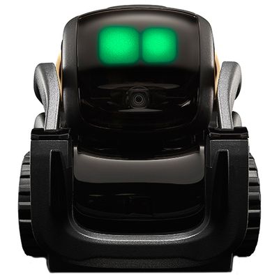 A simple, compact, black wheeled robot smaller then the palm of a hand with two glowing green eyes.