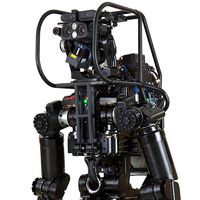 A sleek black humanoid robot with a camera-equipped head.