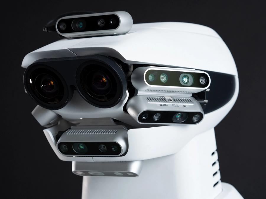 A close-up of the robots head highlighting a multitude of cameras and sensors.