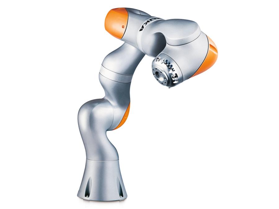 A silver and orange robotic arm stands tall.