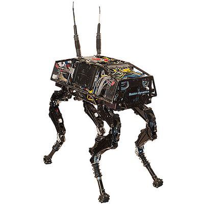 A quadruped, dog-like robot with its electronics exposed.