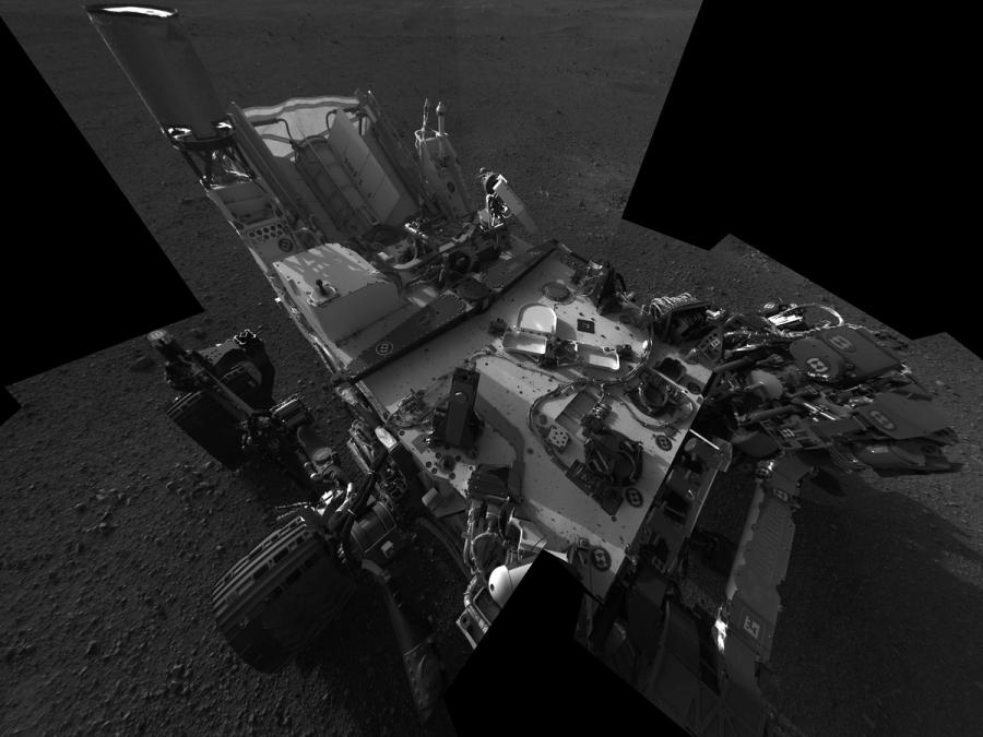 Black and white image of the rover on Mars.