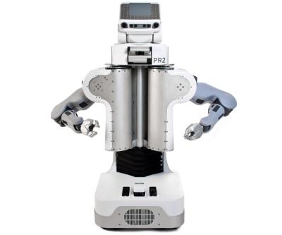 A PR2 mobile robot with a metallic torso, a head with cameras and sensors, two arms with gripper hands, and a mobile base is seen with and without its cover.