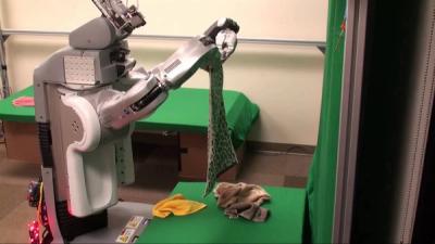 Lazy researchers make PR2 fold their towels.