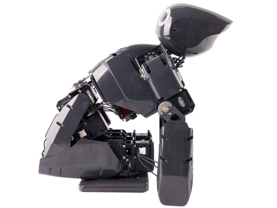 A black humanoid robot bent with knees forward and its torso, head, and arms all the way back.