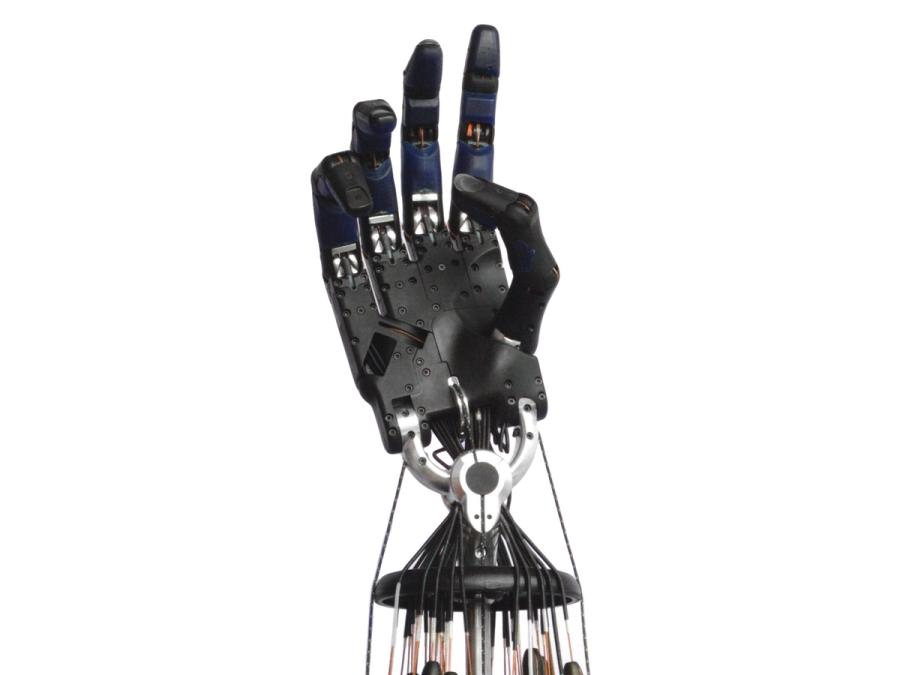 A black prosthetic hand that imitates human fingers and tendons.
