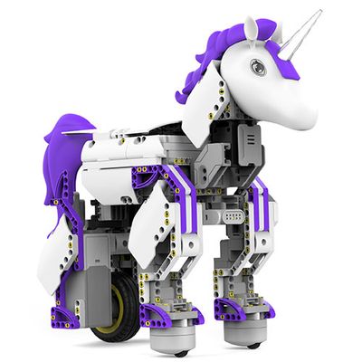 A purple and white unicorn with a white horn and wheels, made up of many small, simple plastic parts.