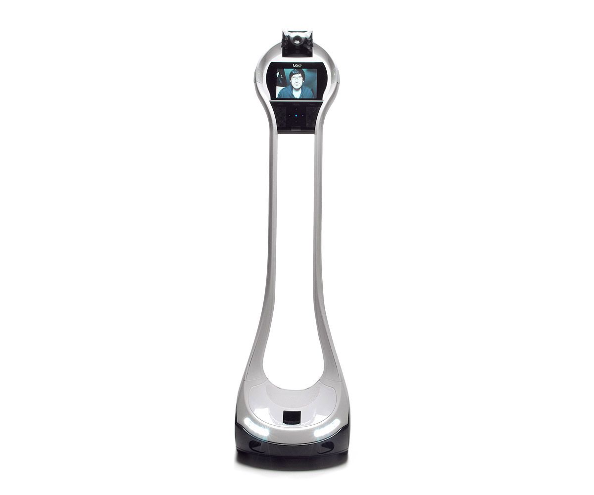 A spinning view of a lightweight white telepresence robot with a thin hollow frame, and a display showing a waving man.