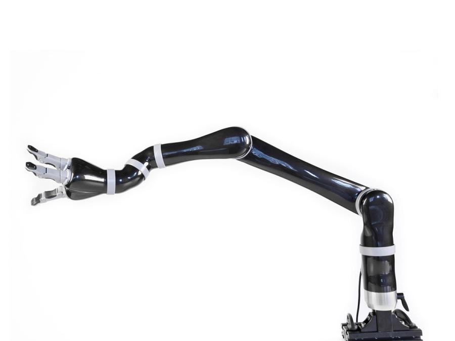 A shiny black and silver three-fingered robotic arm.